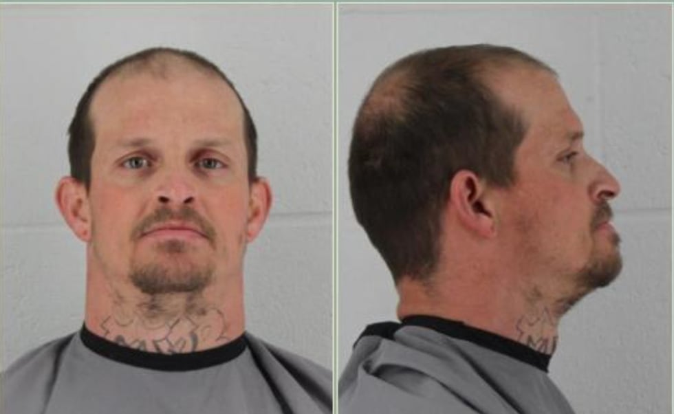 Anthony Mansfield, 36, had been convicted in Johnson County for criminal damage to property.