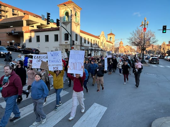 Hundreds gathered in Kansas City to protest after multiple federal shootings were reported,...