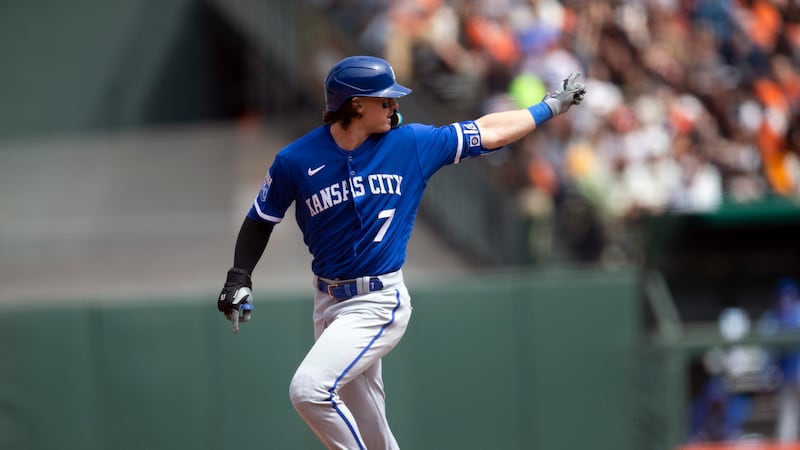 Kansas City Royals' Bobby Witt Jr. (7) gestures as he runs out his solo home run against the...
