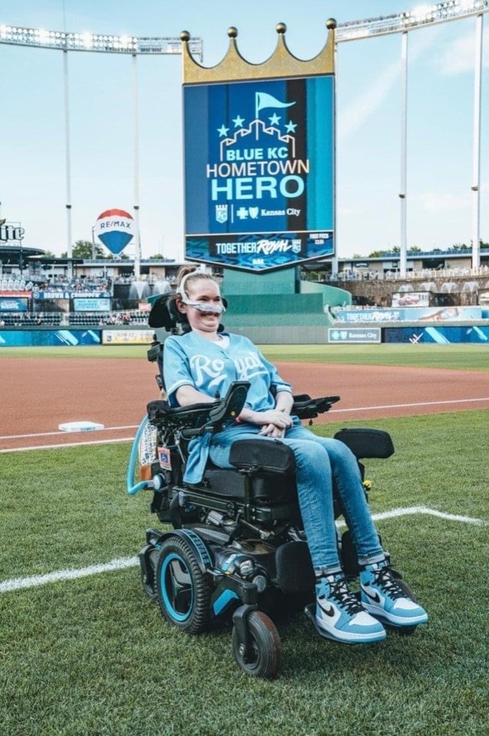 Sarah Na on the field at Kauffman Stadium.