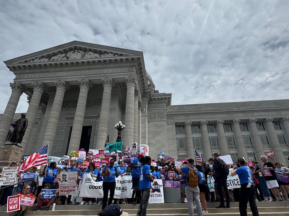 Discarded papers rained down on the representatives in the Missouri House Chamber who cheered...