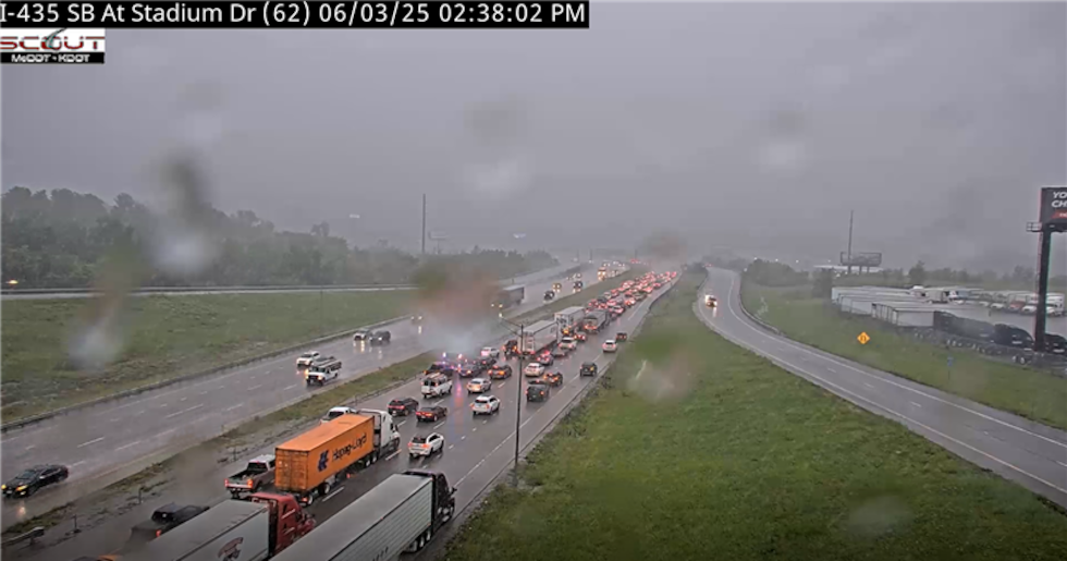 Traffic backed up due to an overturned semi.