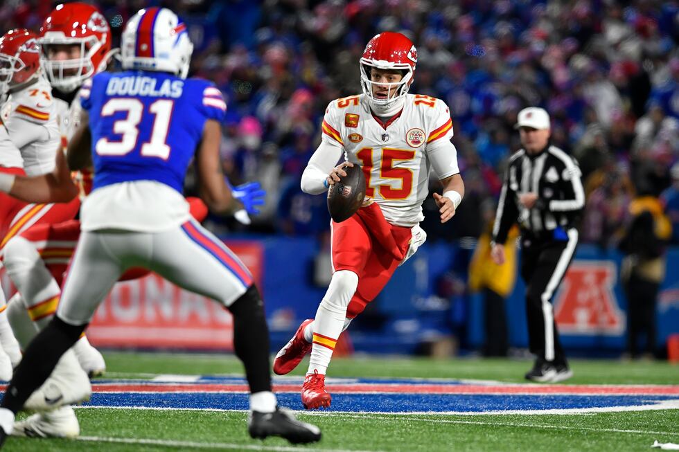 Kansas City Chiefs quarterback Patrick Mahomes (15) runs with the ball during the second half...