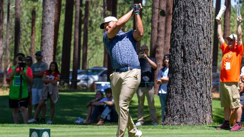 Patrick Mahomes II watches his tee shot on the 14th hole during the final round of the...