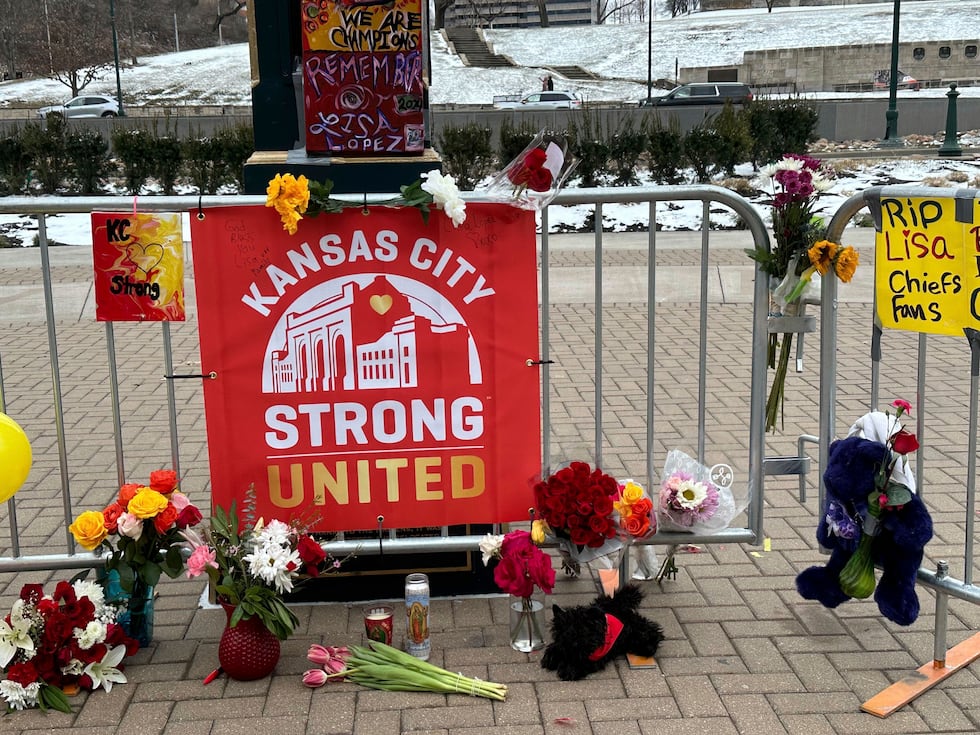 FILE - Flowers, signs and other items are gathered in front of Union Station, Friday, Feb. 16,...