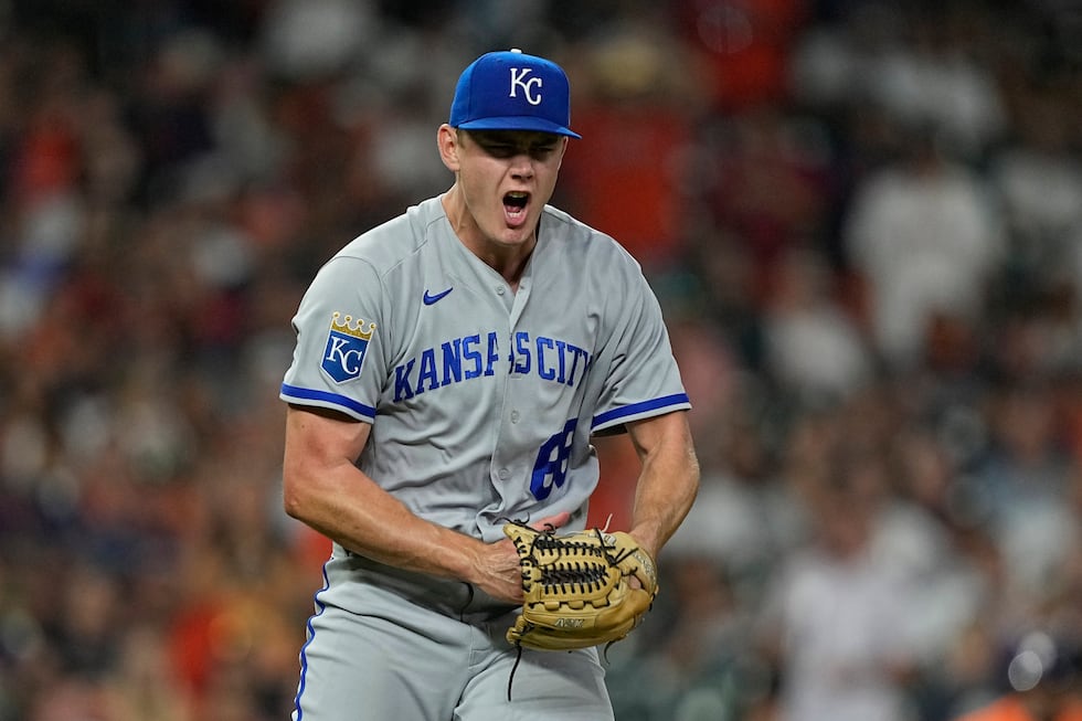 Kansas City Royals relief pitcher James McArthur reacts after striking out Houston Astros'...