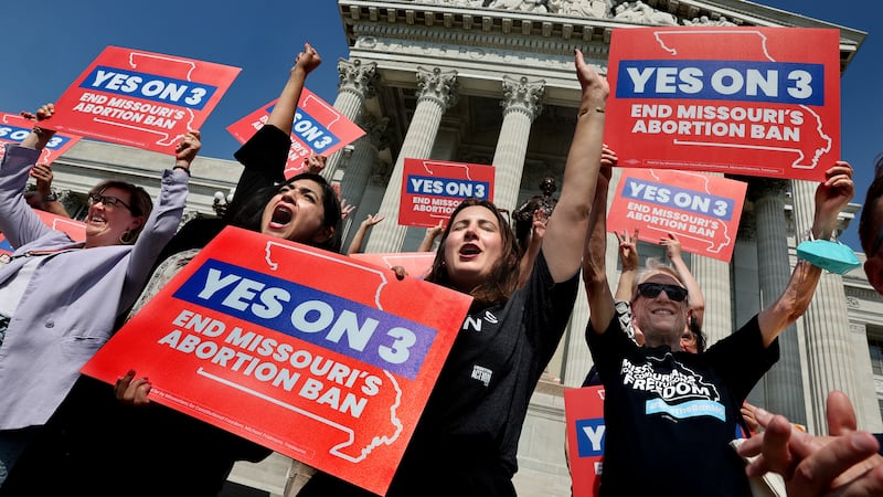 FILE - Amendment 3 ers Luz Maria Henriquez, second from left, executive director of the...