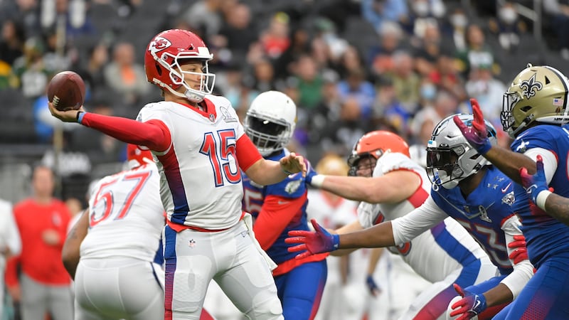 FILE - AFC quarterback Patrick Mahomes (15), of the Kansas City Chiefs passes against the NFC...